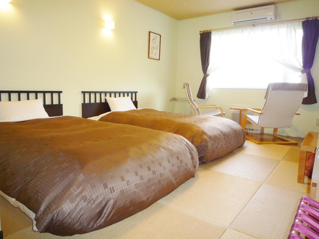 Hotel Resort Inn Niseko Pokoj fotografie